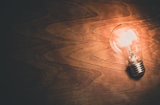 light bulb on wooden background